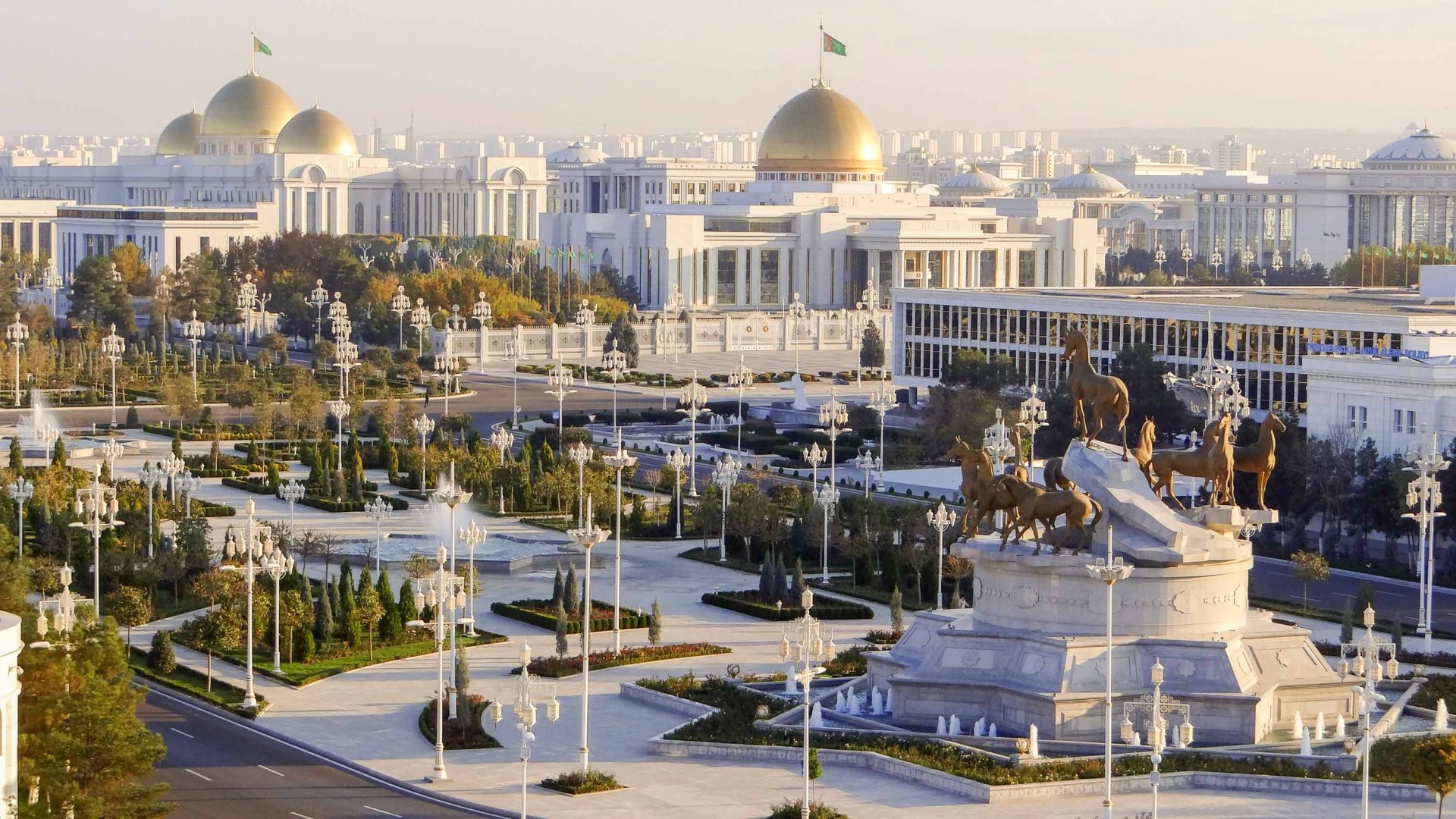 Ashgabat marble architecture with golden sunset